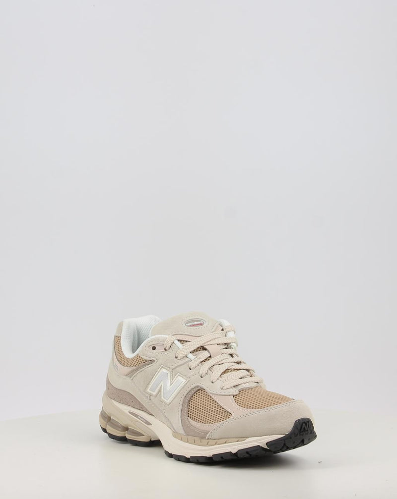 Sneakers NEW BALANCE U2002RB beige